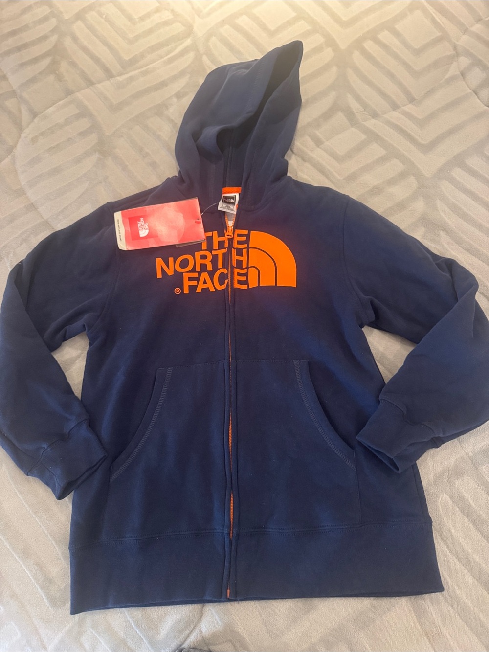 The North Face Navy Hoodie with Bright Orange Logo new jacket